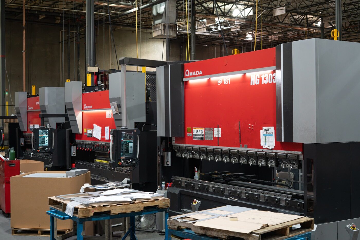 Amada press brakes with automatic tool changers on the SPM forming floor