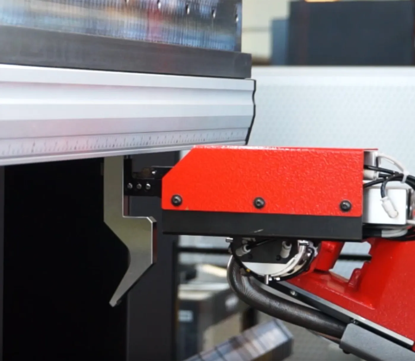 Automated cell loading a metal blank for forming at SPM.