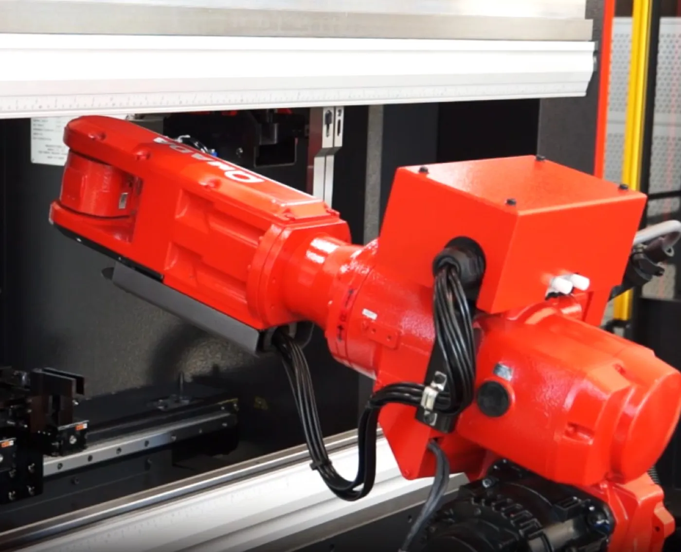 Robotic loading feeding SPM's metal forming operation.