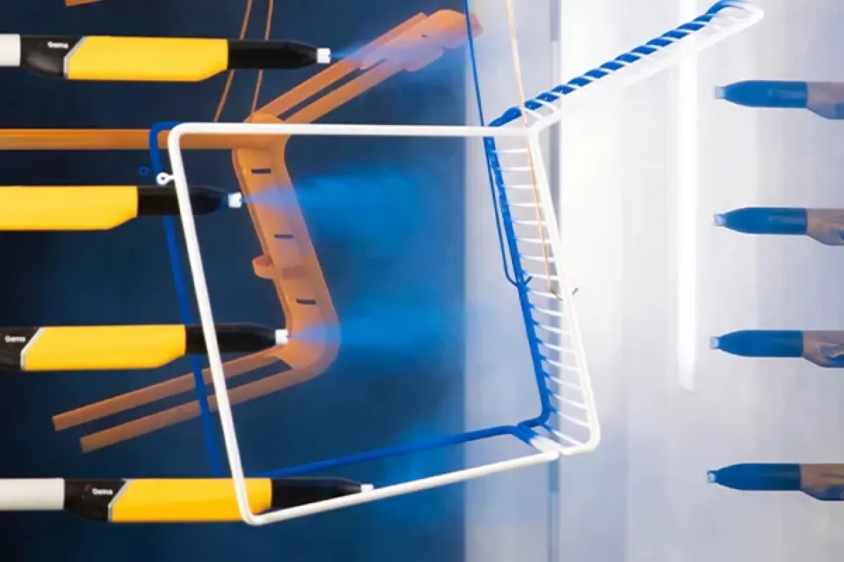 Blue powder-coated parts finished on SPM's in-house line.