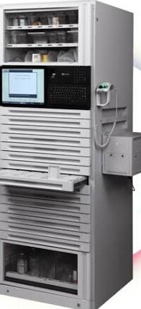 Automated medication dispensing cabinet built from precision sheet metal drawers, panels, and a welded frame.