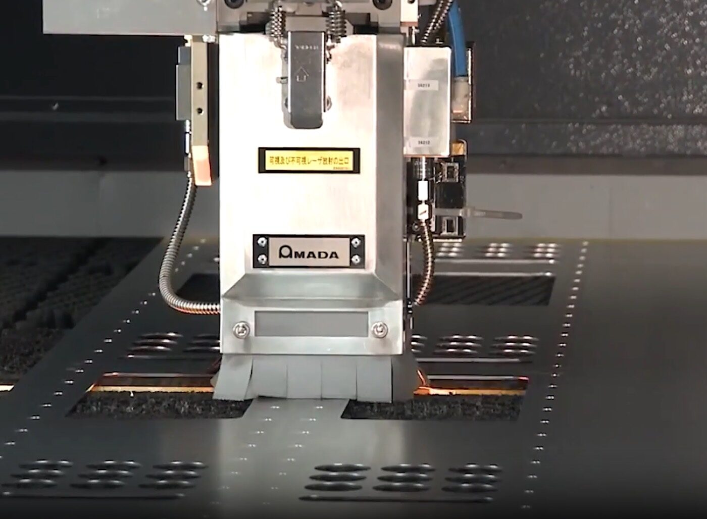 SPM punch/laser combo machine with automated load and unload towers on the laser line