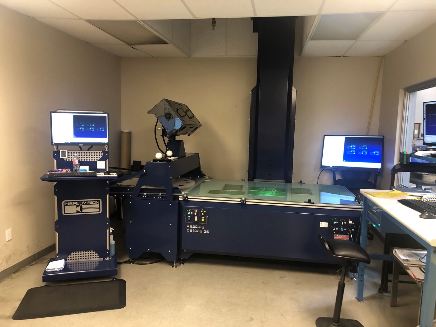 SPM Quality technician operating the InspecVision 3D optical inspection system